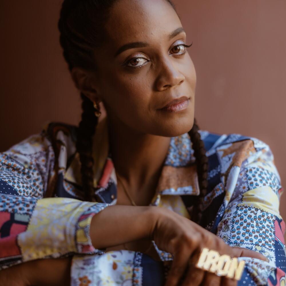 Chinaka Hodge posing for a portrait
