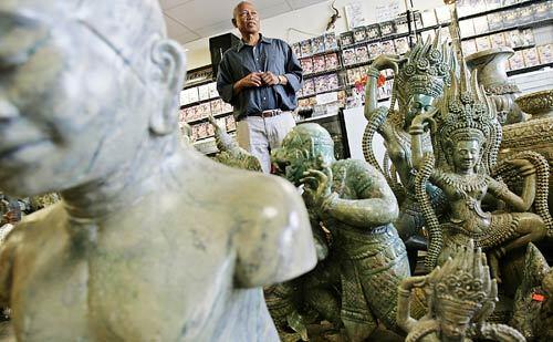 Sopheap Samrieth, owner of an art and video rental shop featuring Cambodian wares in Long Beach, signed the petition supporting the Cambodia Town designation.
