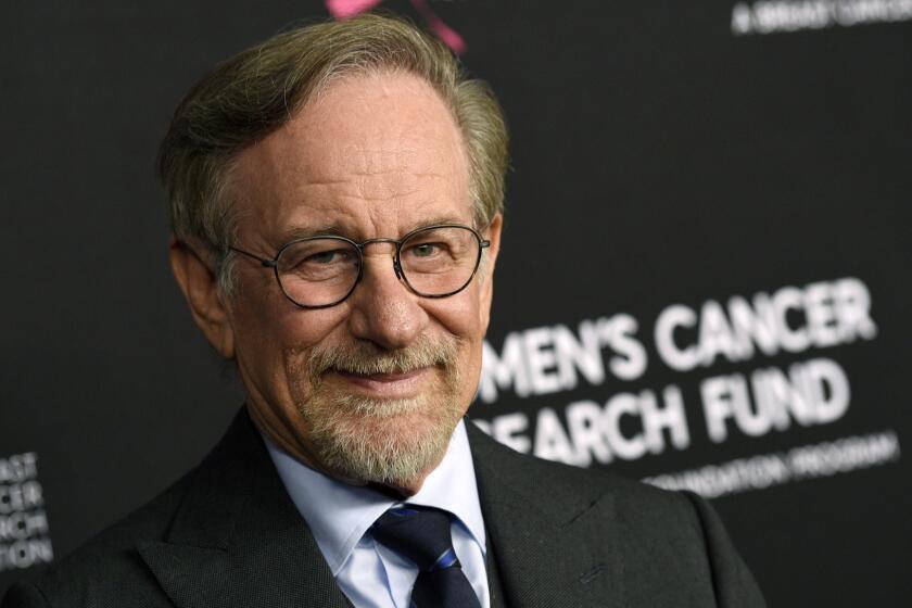 FILE - In this Thursday, Feb. 28, 2019, file photo, filmmaker Steven Spielberg poses at the 2019 "An Unforgettable Evening" benefiting the Women's Cancer Research Fund, at the Beverly Wilshire Hotel, in Beverly Hills, Calif. Reports that Spielberg intends to support rule changes that could block Netflix from Oscars-eligibility have provoked a heated and unwieldy online debate. (Photo by Chris Pizzello/Invision/AP, File)