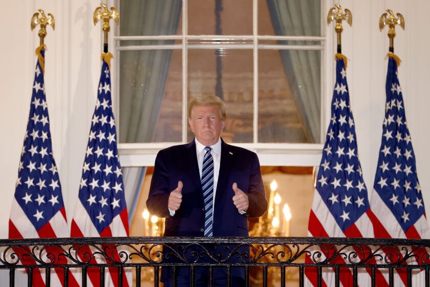WASHINGTON, DC - OCTOBER 05: U.S. President Donald Trump gives a thumbs up upon returning to the White House from Walter Reed National Military Medical Center on October 05, 2020 in Washington, DC. Trump spent three days hospitalized for coronavirus. (Photo by Win McNamee/Getty Images)
