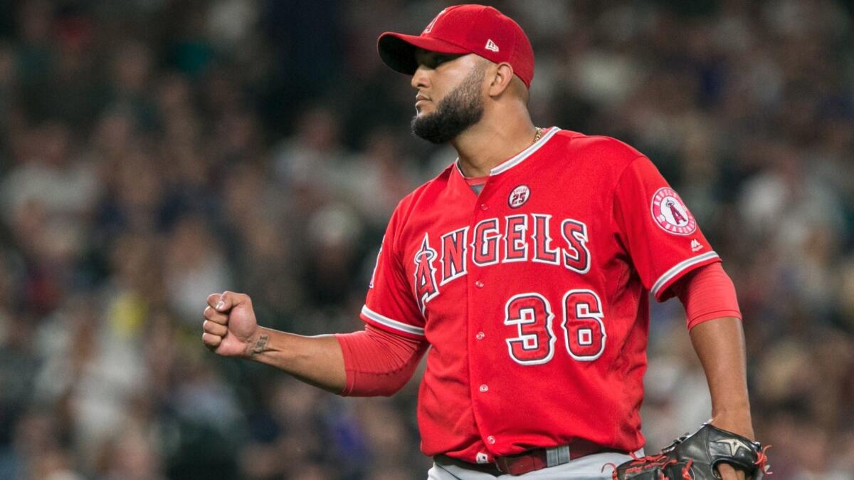 Angels pitcher Yusmeiro Petit celebrates after a win over the Seattle Mariners on Aug. 11.