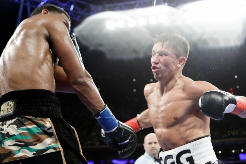 Gennady Golovkin attacks Daniel Jacobs during the fifth round of their middleweight title fight on March 18 at Madison Square Garden.