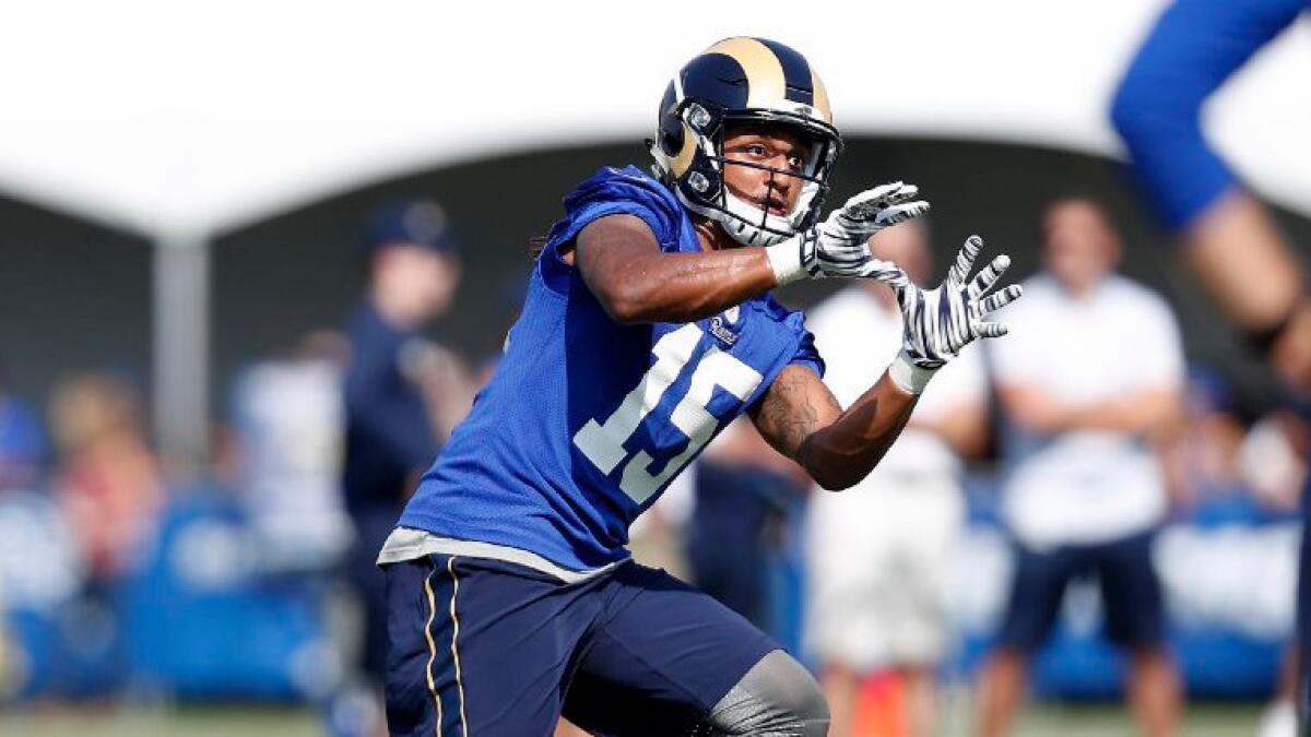 Receiver Bradley Marquez looks for a throw during the Rams' opening practice of training camp in Irvine on July 30.