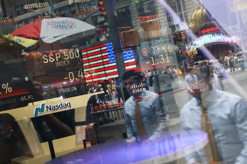 NEW YORK, NY - JULY 30: People are reflected in the window of the Nasdaq MarketSite in Times Square on July 30, 2018 in New York City. As technology stocks continued their slide on Monday, the Nasdaq Composite dropped 1.1 percent in afternoon trading with shares of Facebook, Netflix, Amazon and Google-parent Alphabet all declining. (Photo by Spencer Platt/Getty Images) ** OUTS - ELSENT, FPG, CM - OUTS * NM, PH, VA if sourced by CT, LA or MoD **