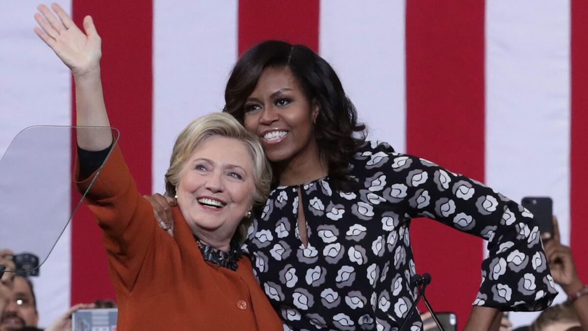 Hillary Clinton and First Lady Michelle Obama campaign for the first time together Thursday in Winston-Salem, N.C.