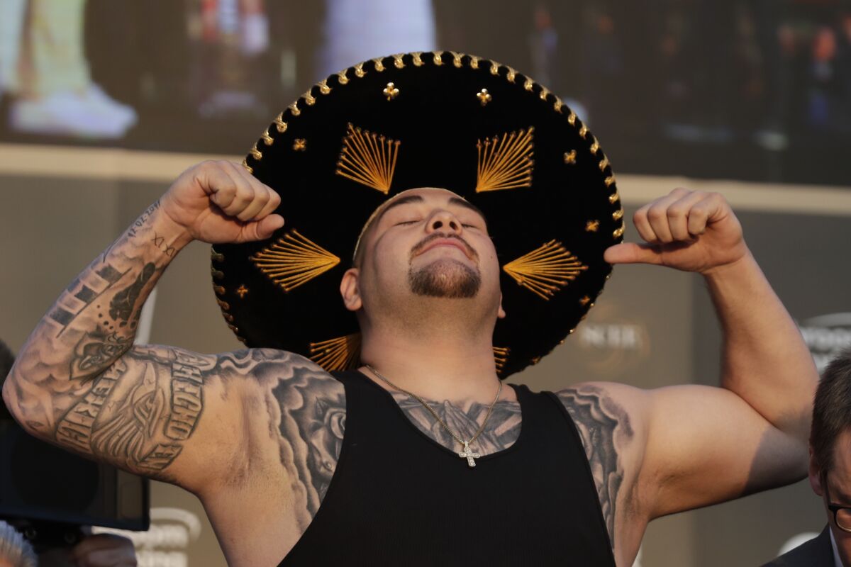 Heavyweight boxer Andy Ruiz Jr. of Mexico poses during a weigh-in at Faisaliah Center, in Riyadh, Saudi Arabia, Friday, Dec. 6, 2019. The first ever heavyweight title fight in the Middle East, has been called the "Clash on the Dunes." Will take place at the Diriyah Arena on Saturday. (AP Photo/Hassan Ammar)