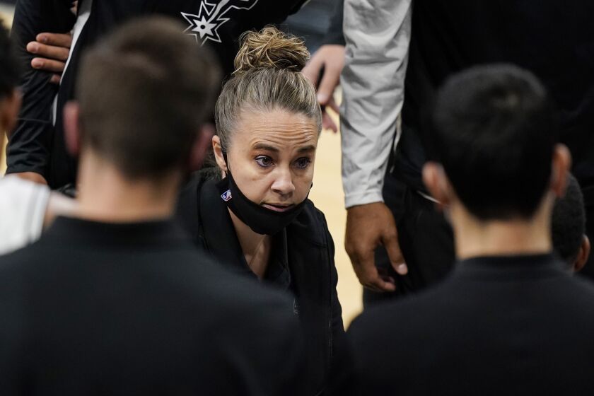 San Antonio Spurs assistant coach Becky Hammon calls a play during a timeout in the second half.