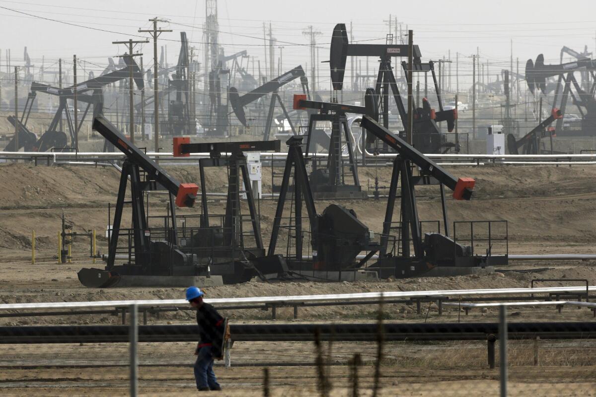 Dozens of pumpjacks fill the landscape at the Kern River Oil Field.