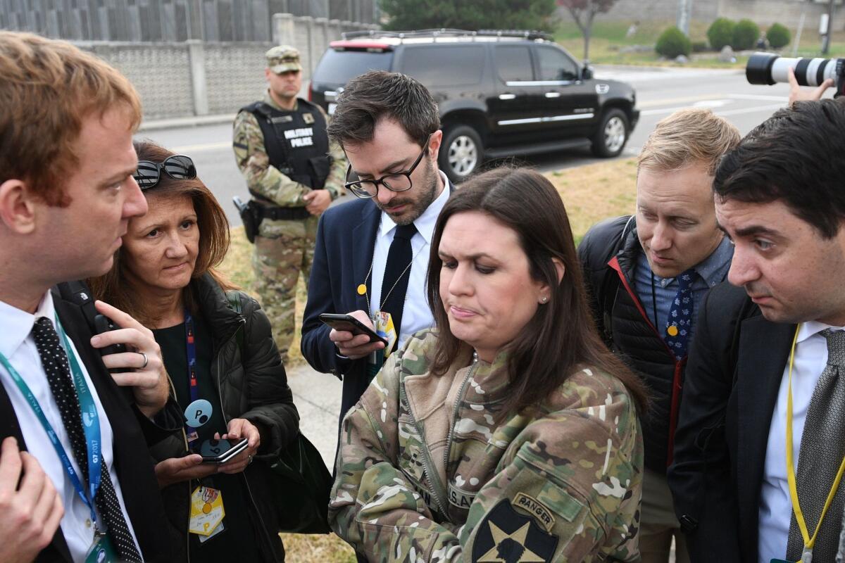White House Press Secretary Sarah Huckabee Sanders speaks to reporters after President Trump's helicopter turned around en route to the DMZ.