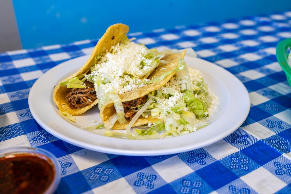 San Diego, CA, May 23 - Beef Tacos with crema y cotija at Las Cuatro Milpas, Friday, May 23, 2025 in San Diego, CA. (Deanna Sandoval / For The Times)
