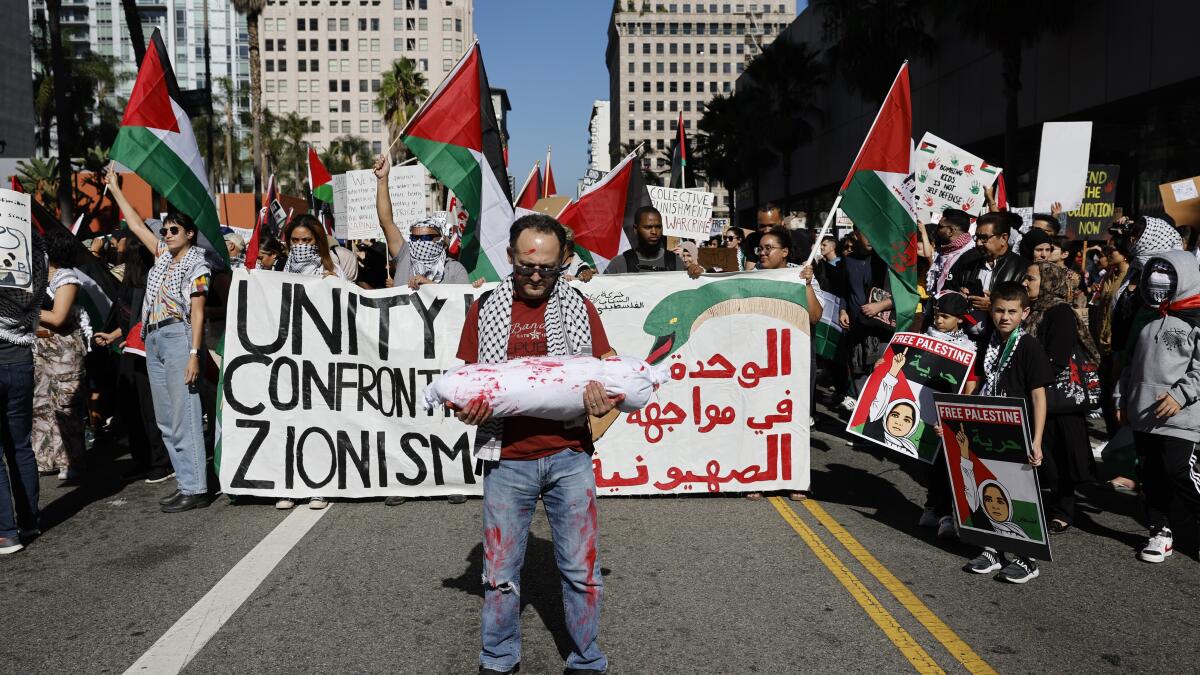 Thousands rally in downtown L.A. against Israel's air and ground war in Gaza