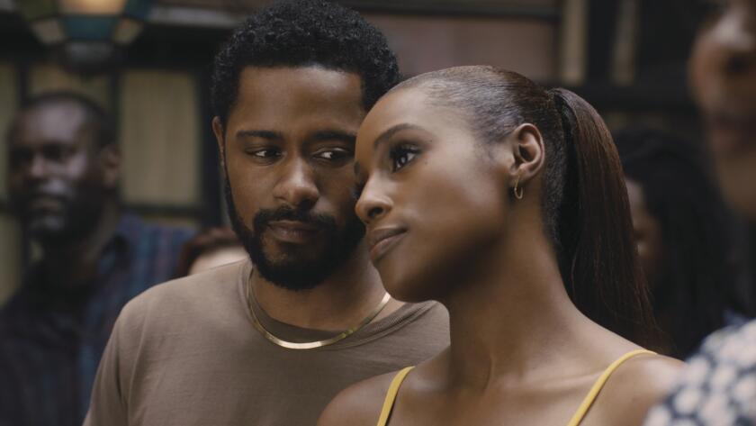 Lakeith Stanfield and Issa Rae in the movie "The Photograph."