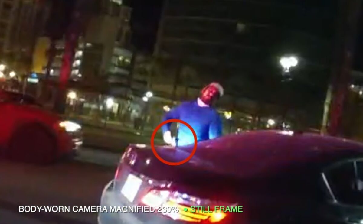 Still frame from Harbor police Officer Cody Horn's body-worn camera shows driver pull out gun March 1 near Convention Center