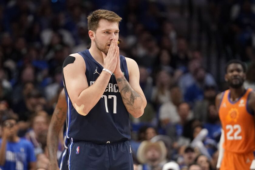 Dallas Mavericks guard Luka Doncic reacts after being charged with a technical foul in the first half of Game 4 of an NBA basketball second-round playoff series against the Phoenix Suns, Sunday, May 8, 2022, in Dallas. (AP Photo/Tony Gutierrez)