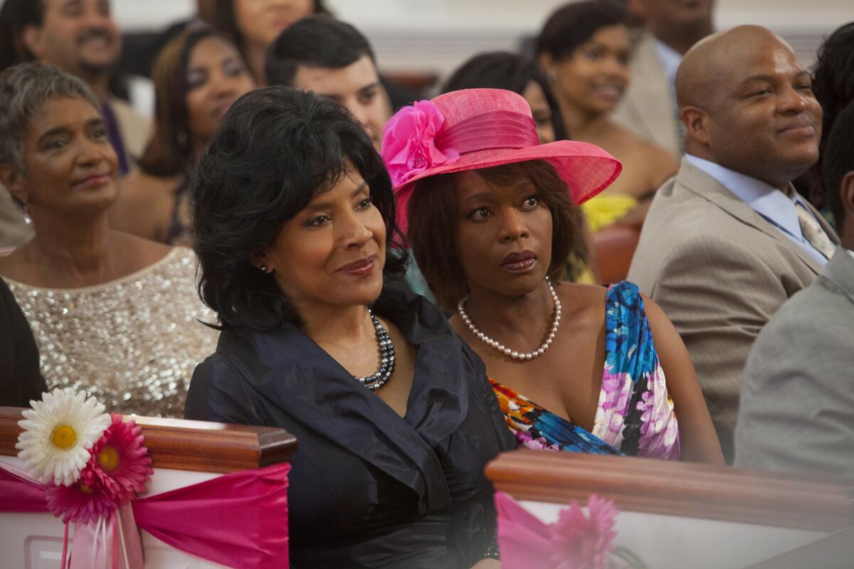 Phylicia Rashad, left, and Alfre Woodard appear in a scene from Lifetime's "Steel Magnolias." Woodard was nominated for an Emmy Award for best supporting actress in a miniseries or movie.