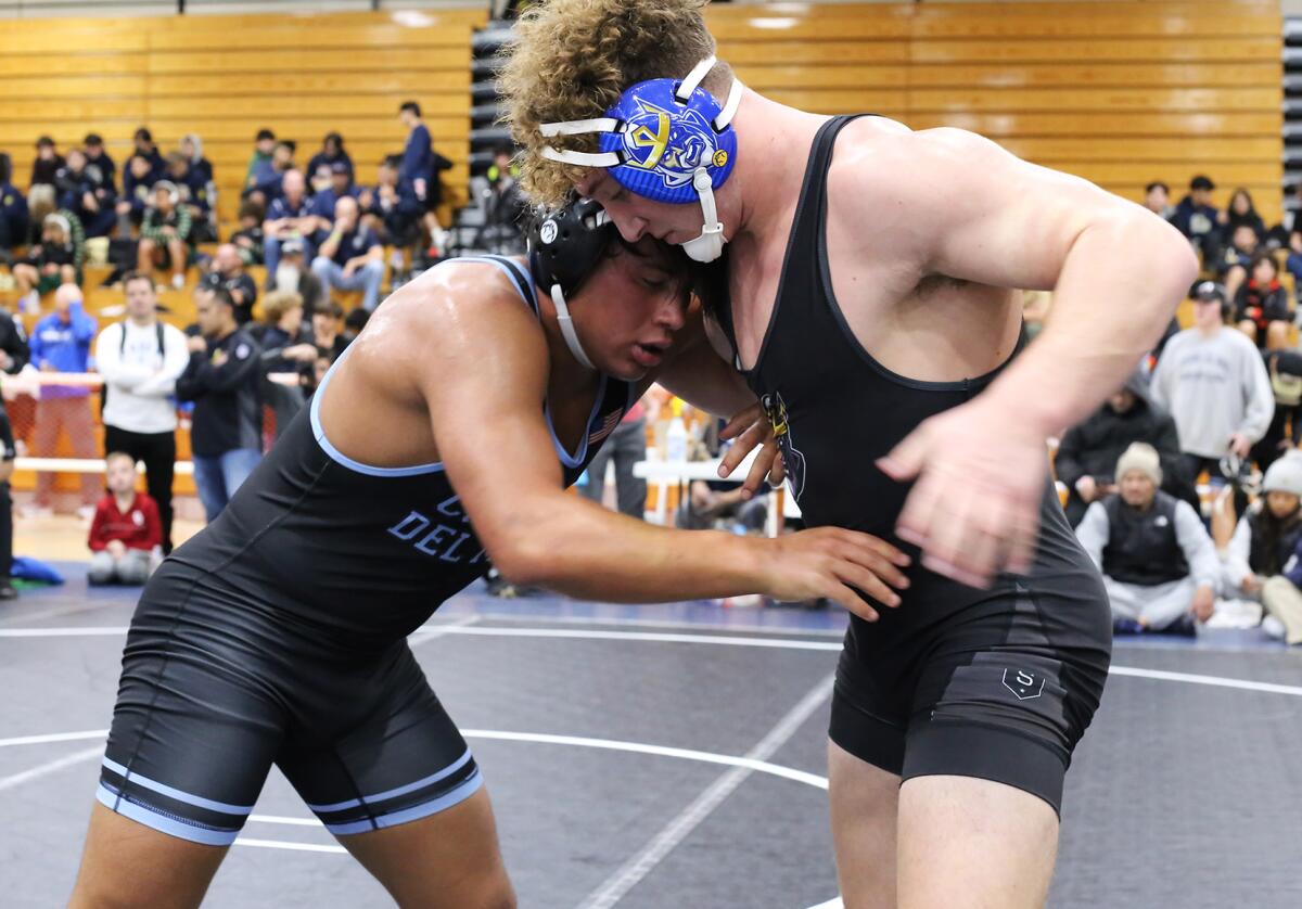 Corona del Mar's Eugenio Franco, left, and Fountain Valley's Ryland Whitworth in the 195-pound final of the Mann Classic.
