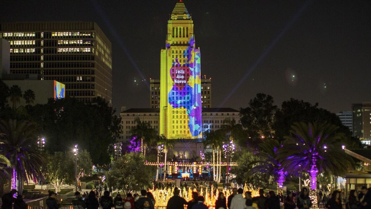 YU+co's projection onto Los Angeles City Hall during a New Year's Eve celebration in 2015.