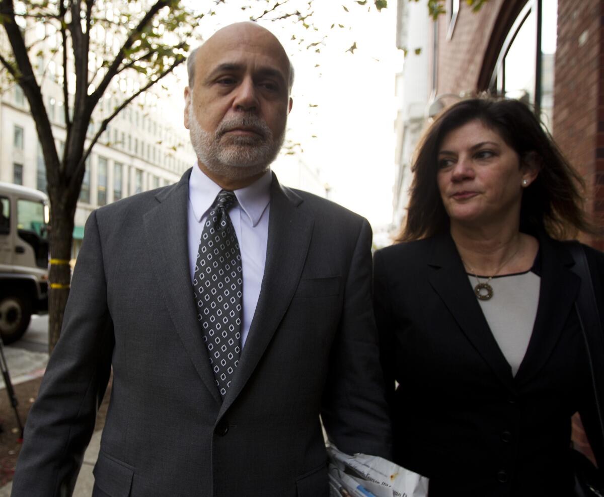 Former Federal Reserve Chairman Ben Bernanke arrives at the U.S. Court of Federal Claims in Washington to testify in a suit on the U.S. government's 2008 bailout of AIG.