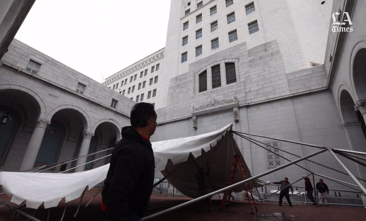 A large tent being installed for public attendance at Tuesday’s Los Angeles City Council meeting. The public was not allowed in the council chamber.