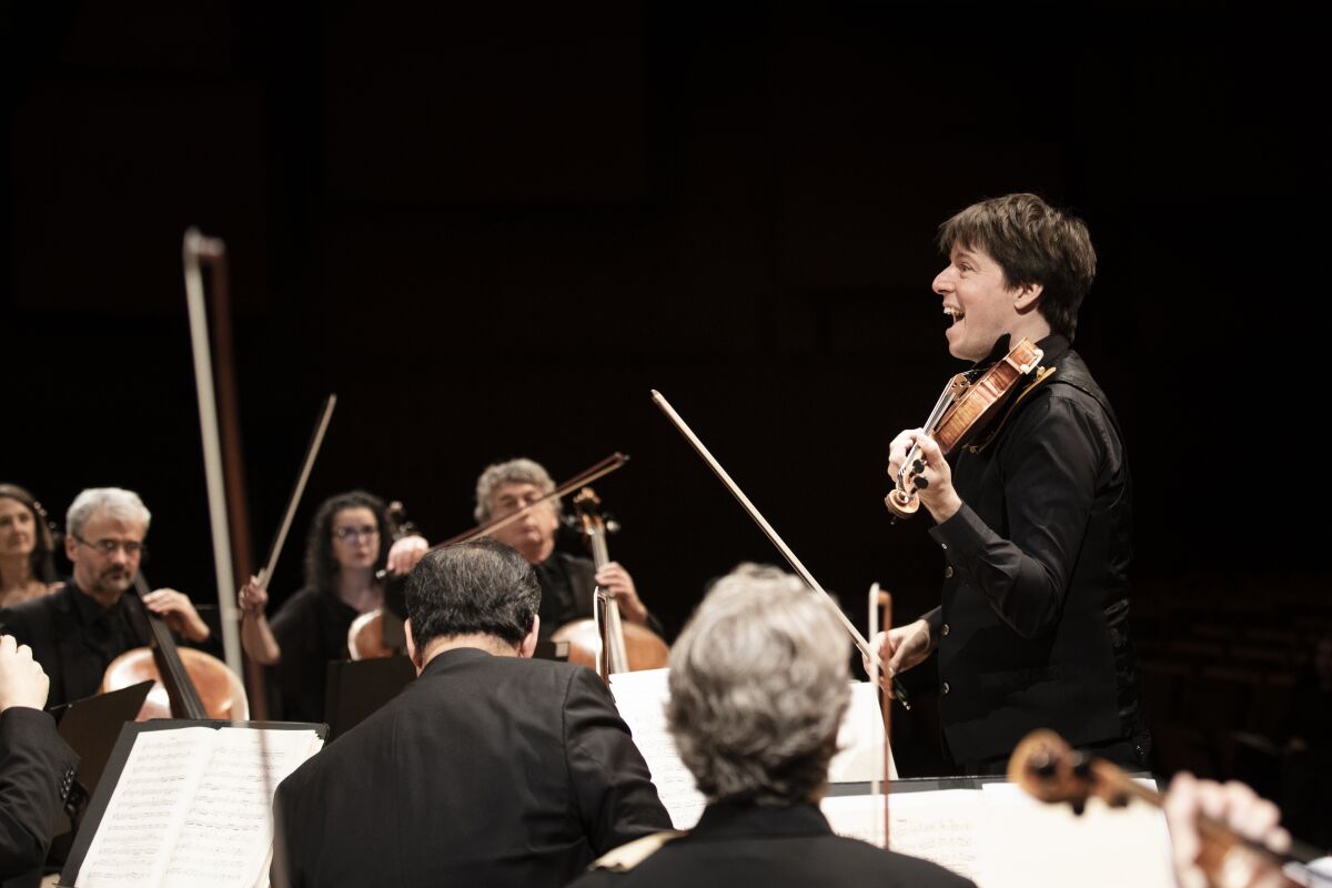 Violinist Joshua Bell rehearses with the Academy of St. Martin in the Fields orchestra in Zagreb, Croatia, in 2019.