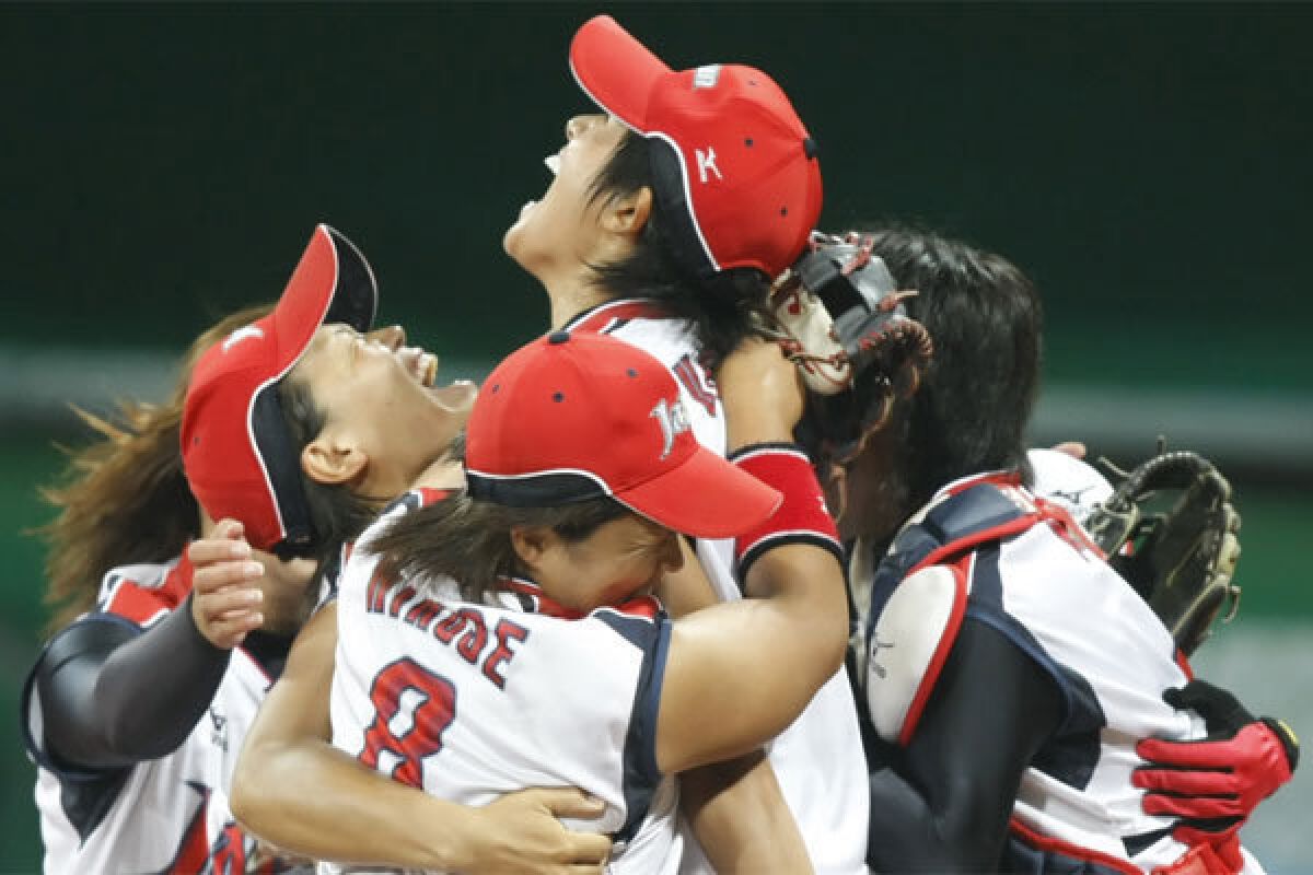 Japanese players celebrate a victory over the U.S. to win the gold medal in the 2008 Beijing Olympics.