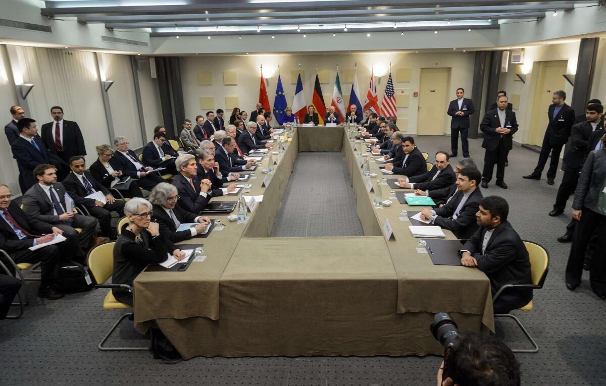 European Union officials and Iranian officials start a meeting on Iran's nuclear program at the Beau Rivage Palace Hotel in Lausanne, Switzerland, on March 30.