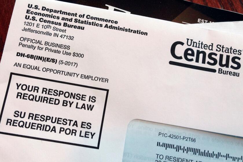 FILE - This March 23, 2018 file photo shows an envelope containing a 2018 census letter mailed to a U.S. resident as part of the nation's only test run of the 2020 Census. As the U.S. Supreme Court weighs whether the Trump administration can ask people if they are citizens on the 2020 Census, the Census Bureau is quietly seeking comprehensive information about the legal status of millions of immigrants. (AP Photo/Michelle R. Smith, File)
