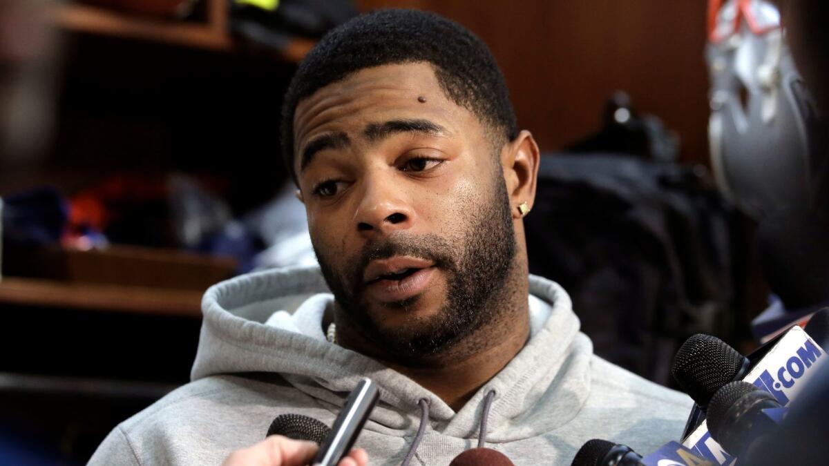 New England Patriots cornerback Malcolm Butler talks to reporters following practice on Jan. 25.