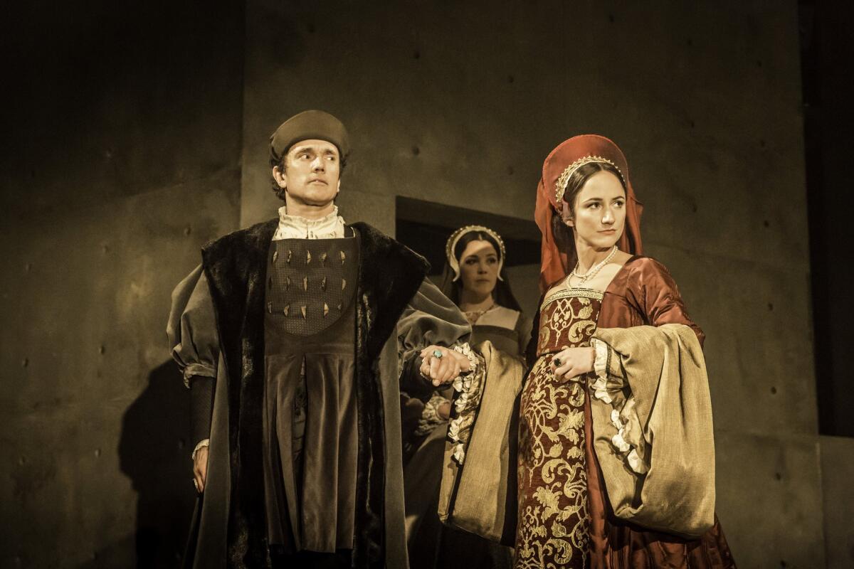 Ben Miles, left, and Lydia Leonard perform in a scene from "Wolf Hall."