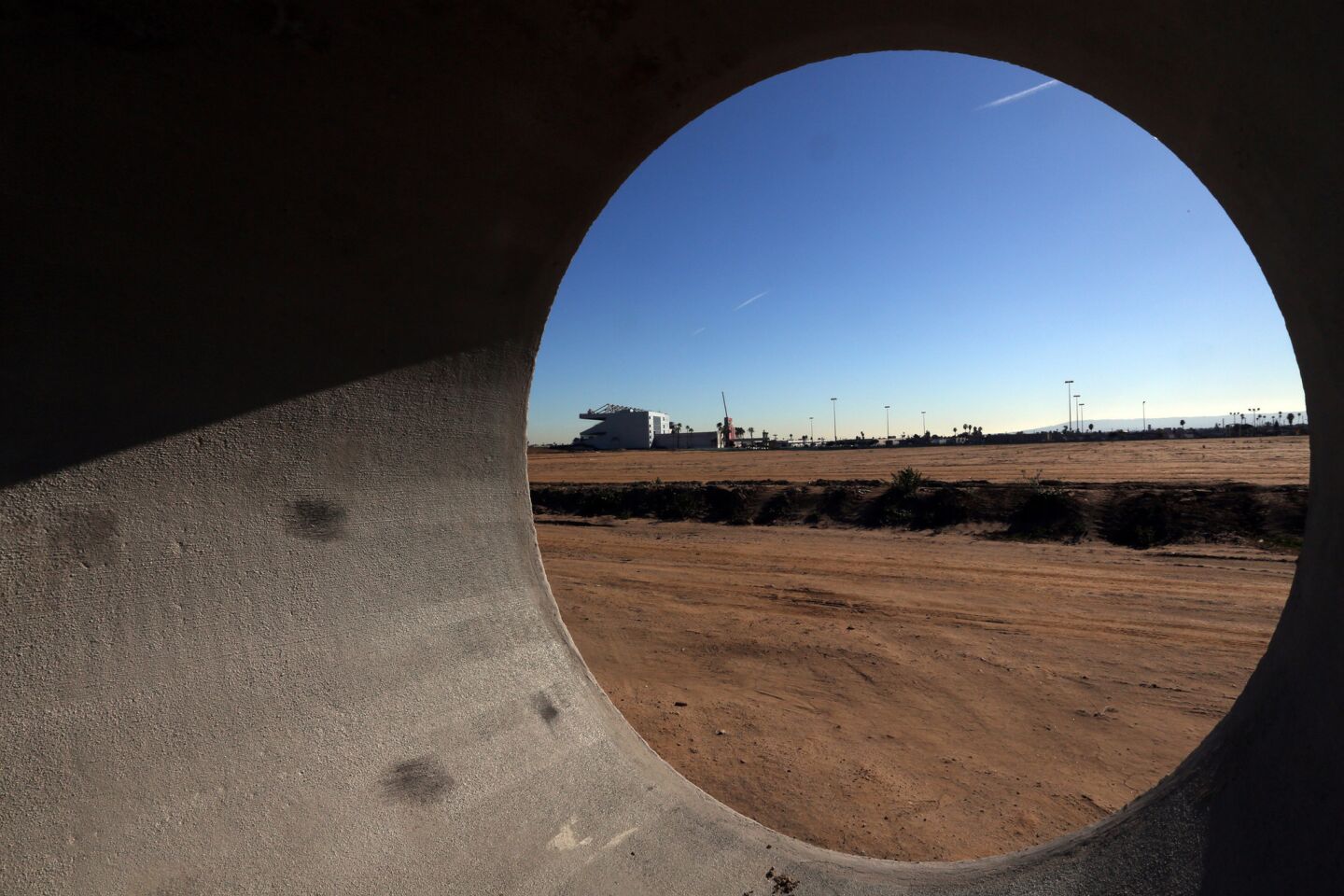 INGLEWOOD,CA., DECEMBER 18, 2015: Giant concrete pipes frame the site of the former Hollywood Park in Inglewood where an NFL stadium will eventually be constructed December 20, 2015 (Mark Boster / Los Angeles Times ).