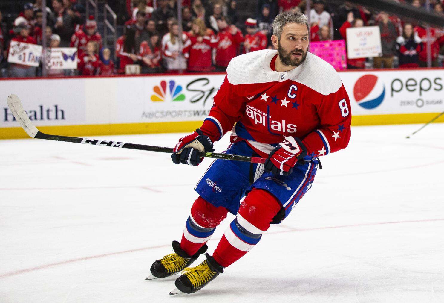 Download Washington Capitals stars Vrana and Ovechkin in action