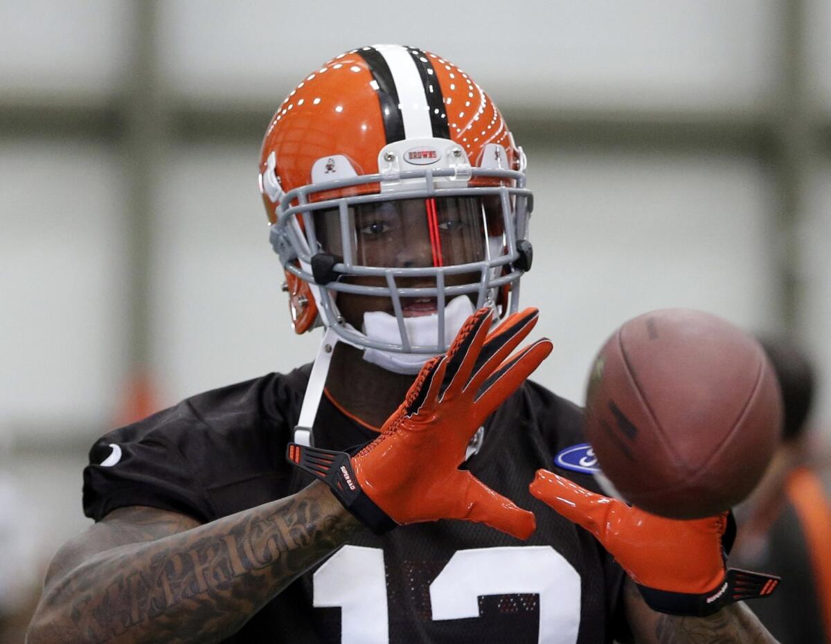 Browns receiver Josh Gordon will be eligible to return to Cleveland this season after his one-year suspension was reduced to 10 games under the NFL's revised substance of abuse policy.