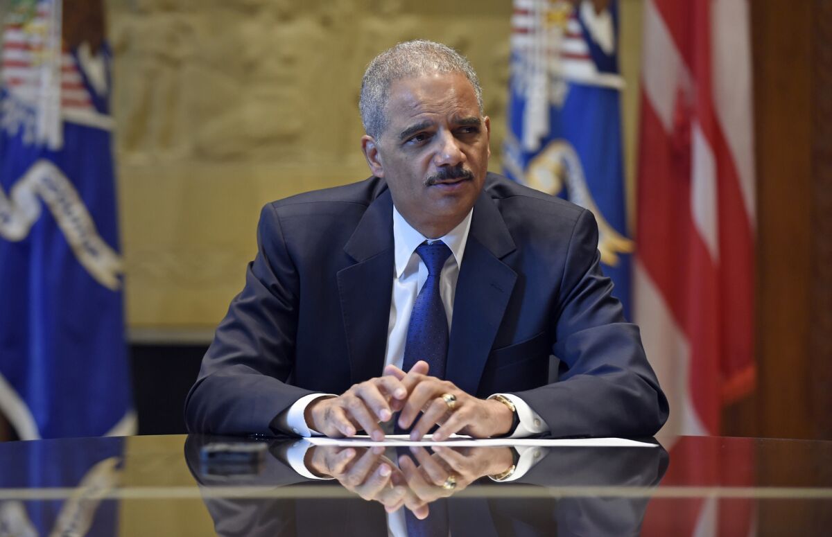 Atty. Gen. Eric H. Holder Jr. speaks during an interview with the Associated Press at the Justice Department on Sept. 16.