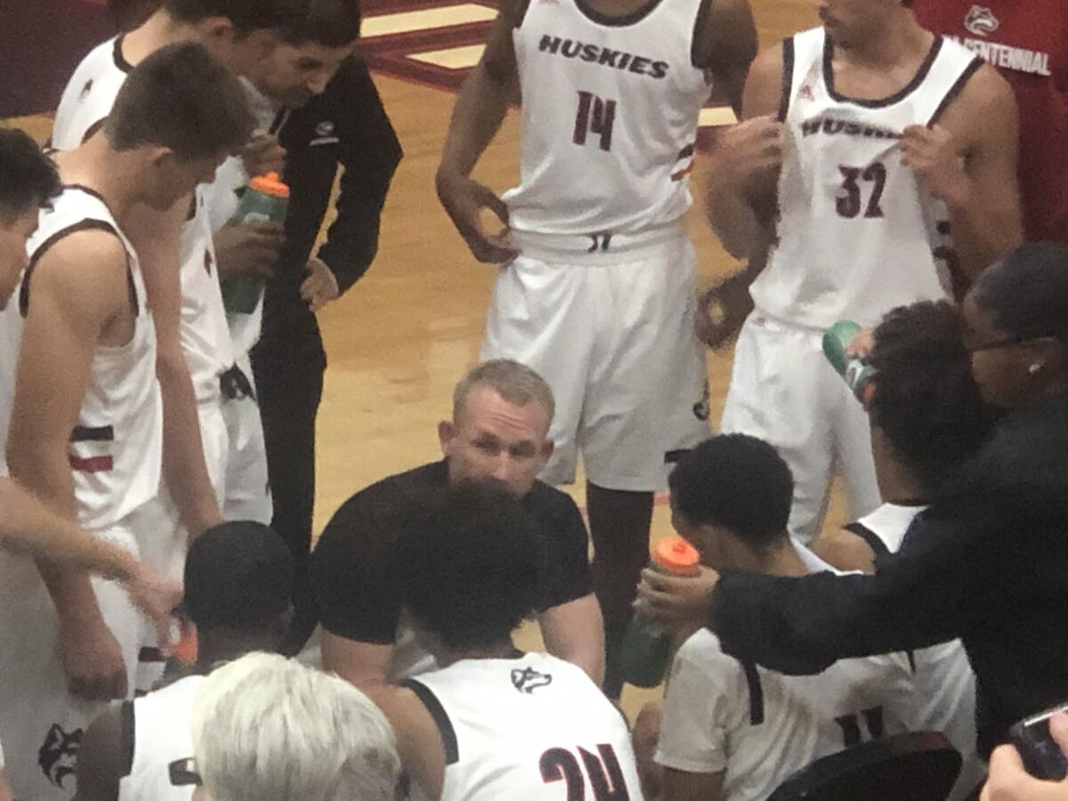 Corona Centennial coach Josh Giles talks to his team during a timeout. The Huskies upset No. 2-ranked Santa Ana Mater Dei on Friday night in Las Vegas.