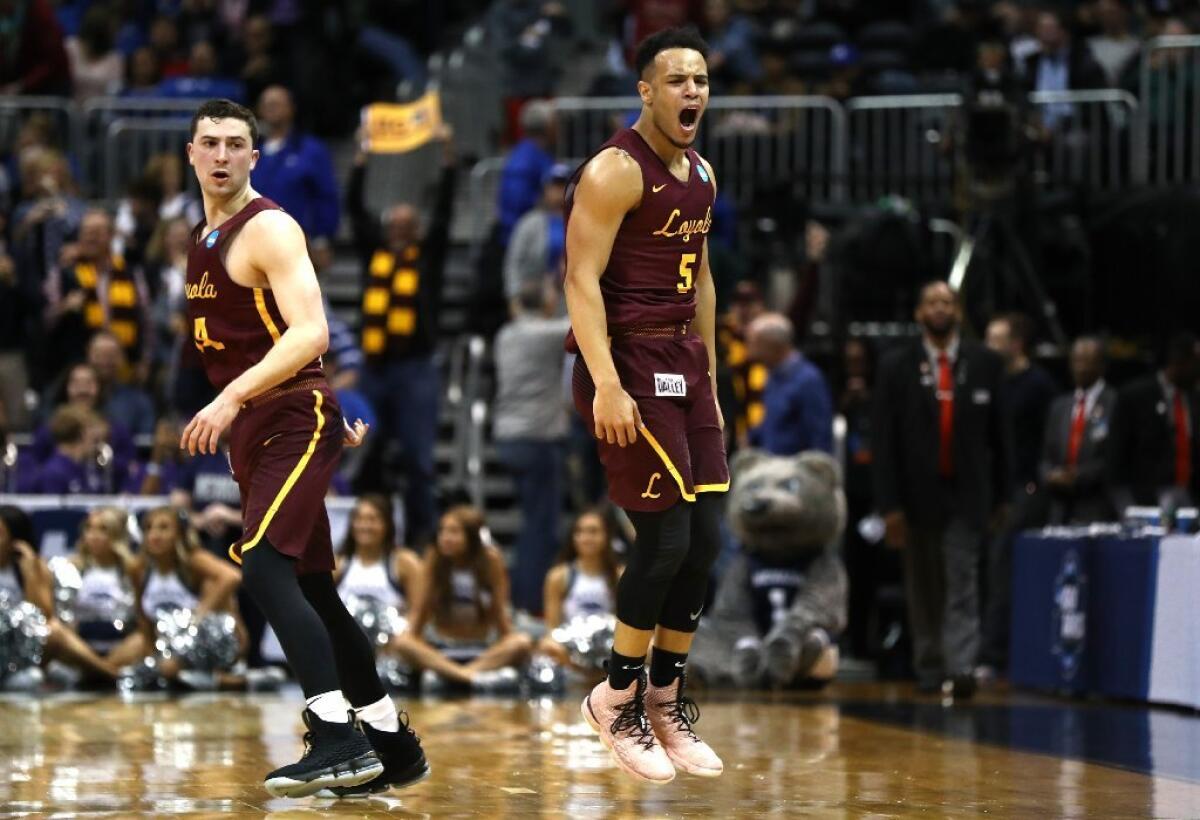 Loyola Chicago's Marques Townes celebrates after hitting a three-pointer late in the second half.