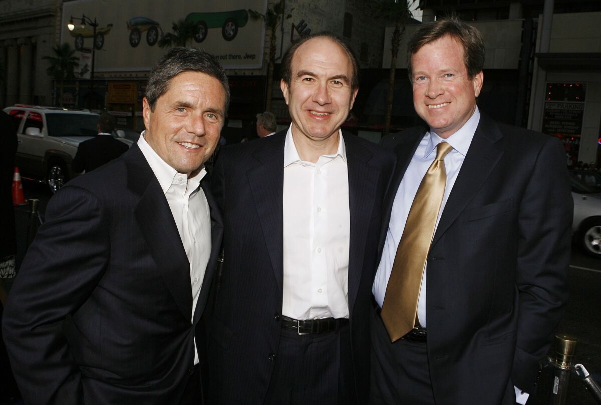 Viacom has extended the employment agreement of Chief Operating Officer Tom Dooley, right, through December 2018. He is shown in 2007 with Paramount Chief Executive Brad Grey, left, and Viacom CEO Philippe Dauman.