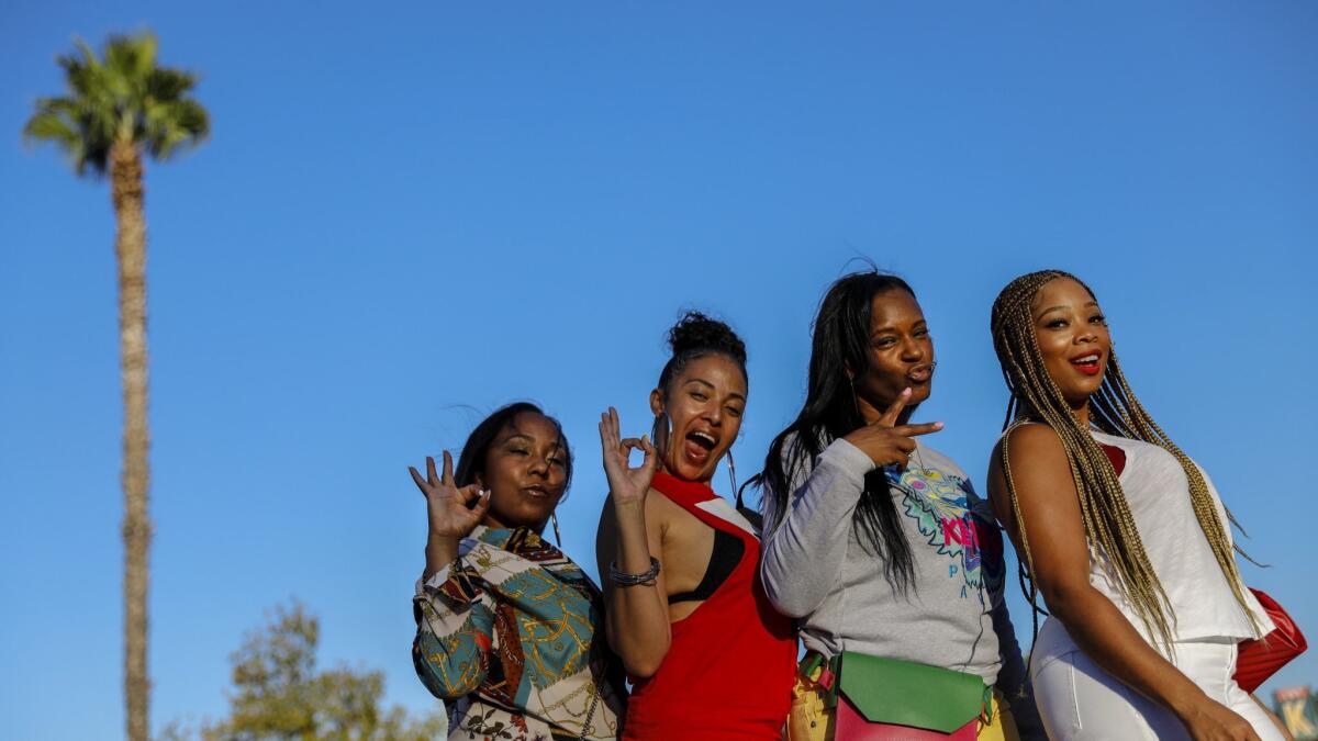 Michi Davis, from left, Jenny Rose, Yackisha Allen and Tish Hosang outside the Rose Bowl.