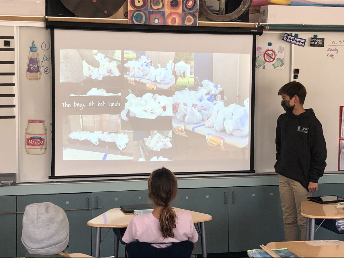 A Paul Ecke sixth grader shows what the plastic bags looked like during lunchtime.