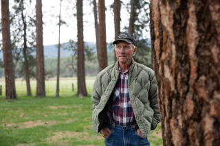 Patrick Griffin poses in a wooded meadow in Siskiyou County.