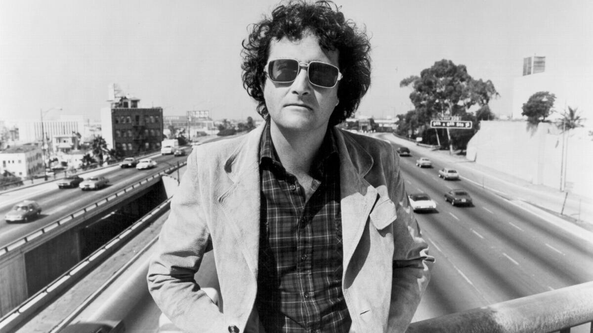 "I don't like writing songs that will just go away,” says Randy Newman, shown on his 1977 album, “Little Criminals,” which included the hit single “Short People.”