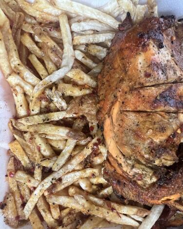 French fries and chicken from Dino's Chicken
