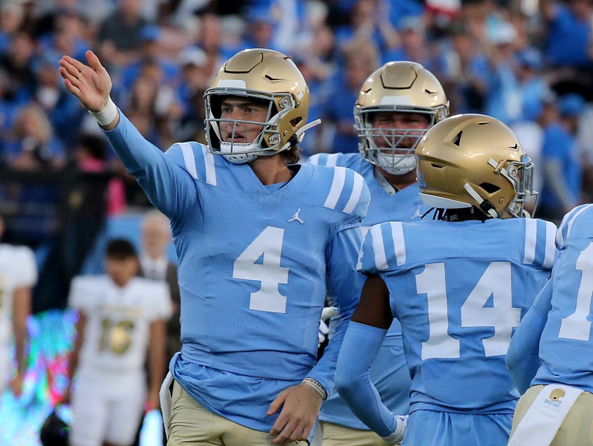 UCLA quarterback Ethan Garbers signals a first down after scrambling during a win over Colorado.
