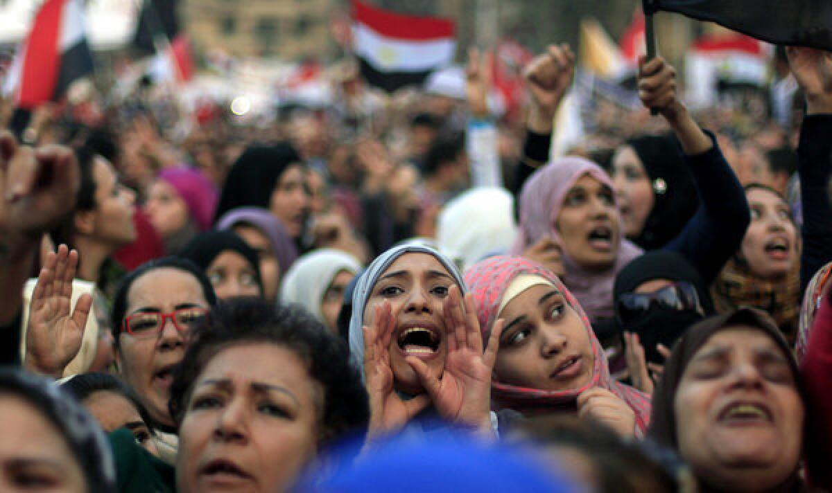 Egyptian protesters chant slogans against President Mohamed Morsi in Tahrir Square in Cairo.