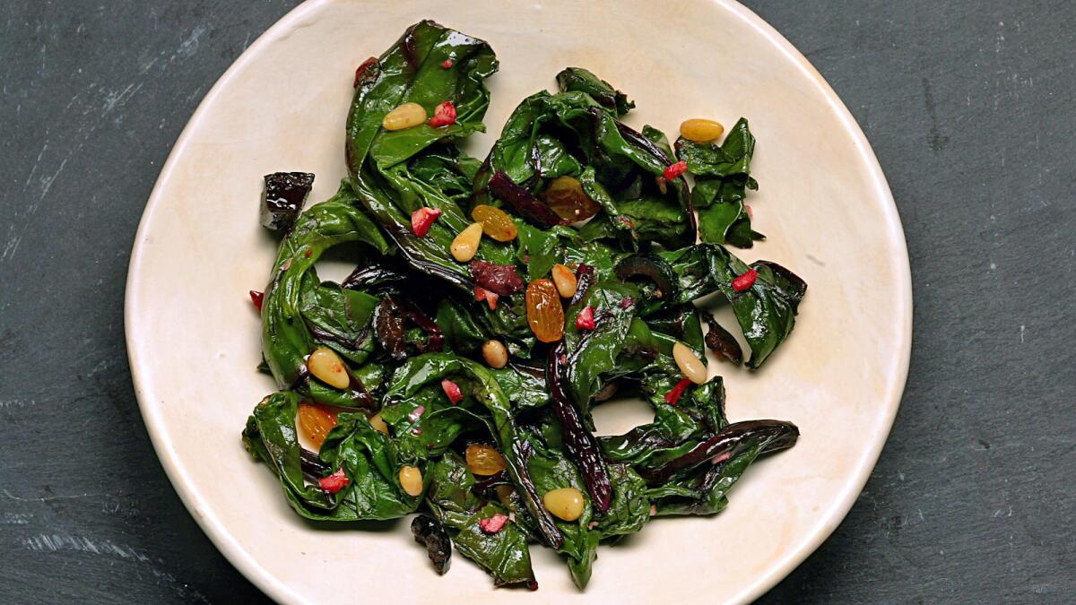Beet greens can be stewed with golden raisins and pine nuts and then served at room temperature in a dish that is popular during the hot summer months. Recipe: Beet greens with golden raisins and pine nuts