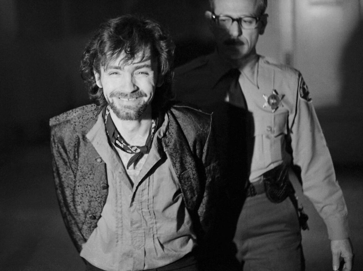 Charles Manson goes to lunch after an outbreak in court that resulted in his ejection, along with three women co-defendants, from the his murder trial in Los Angeles.