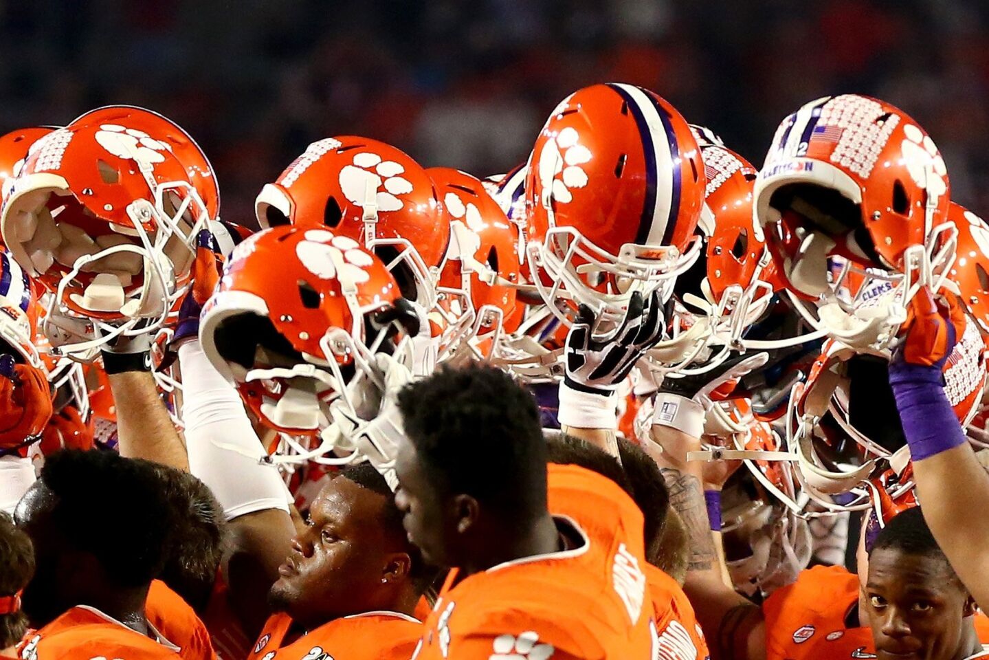 Clemson players huddle before taking on the Alabama Crimson Tide in the 2016 College Football Playoff championship game.