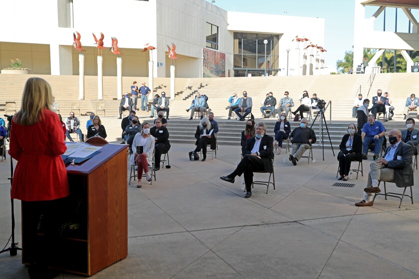 Visitors are seated socially distanced as Mayor Lyn Semeta speaks on Friday morning.