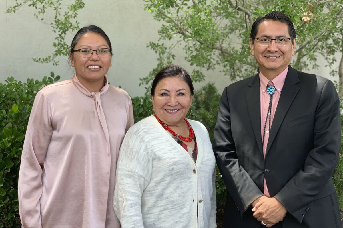 This photo provided by Jared Touchin shows Navajo Nation health director Jill Jim, left, Navajo-area Indian Health Service director Roselyn Tso and Navajo Nation President Jonathan Nez in Albuquerque, N.M., on July 29, 2019. President Joe Biden announced Wednesday, March 9, 2022, that he will nominate Tso to oversee the Indian Health Service. (Jared Touchin via AP)