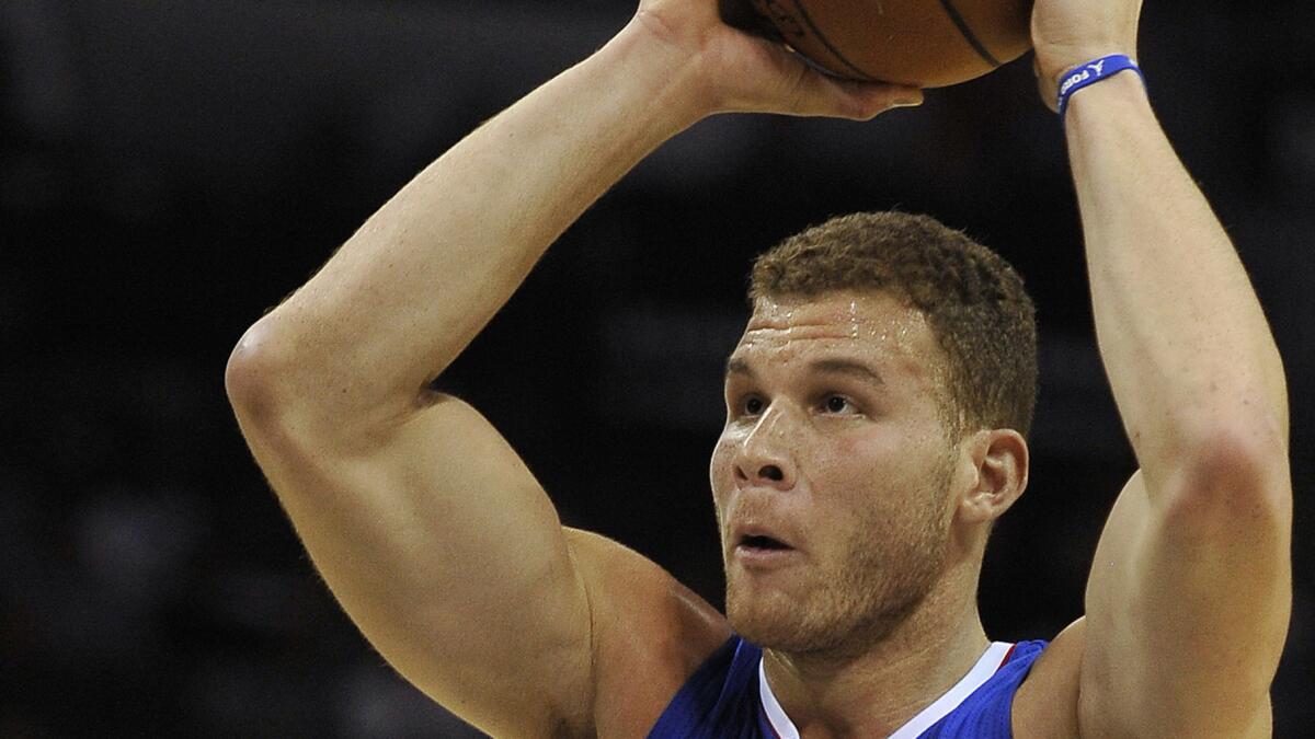 Clippers power forward Blake Griffin looks to pass against the San Antonio Spurs on Dec. 22.