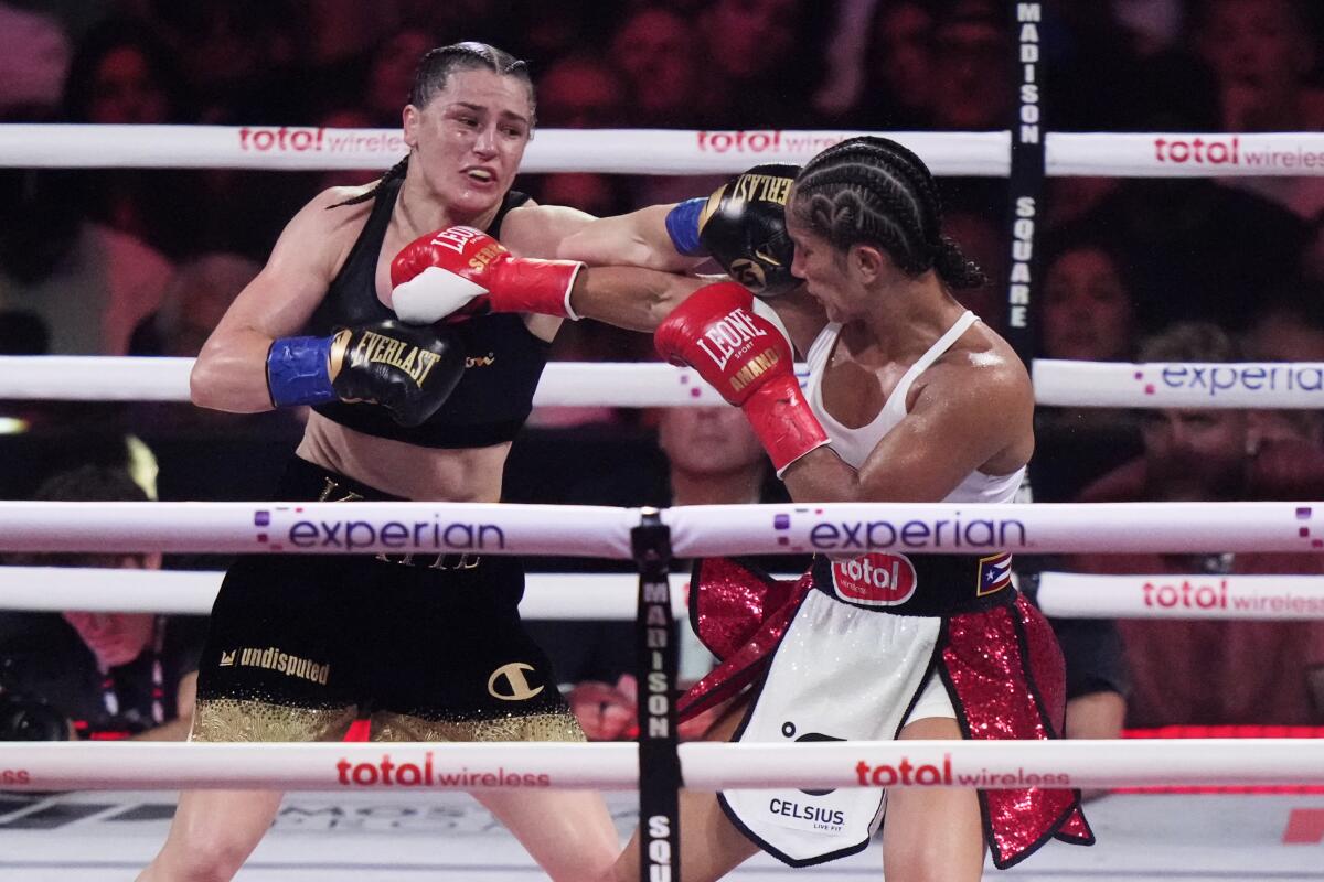Ireland's Katie Taylor, left, punches Puerto Rico's Amanda Serrano during the ninth rou